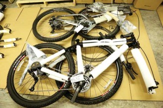 Bike parts are manufactured in China and shipped to the warehouse where the Giantnerd staff either fully assembles the bike or ships it to the buyer in three pieces (above) to easily assemble.