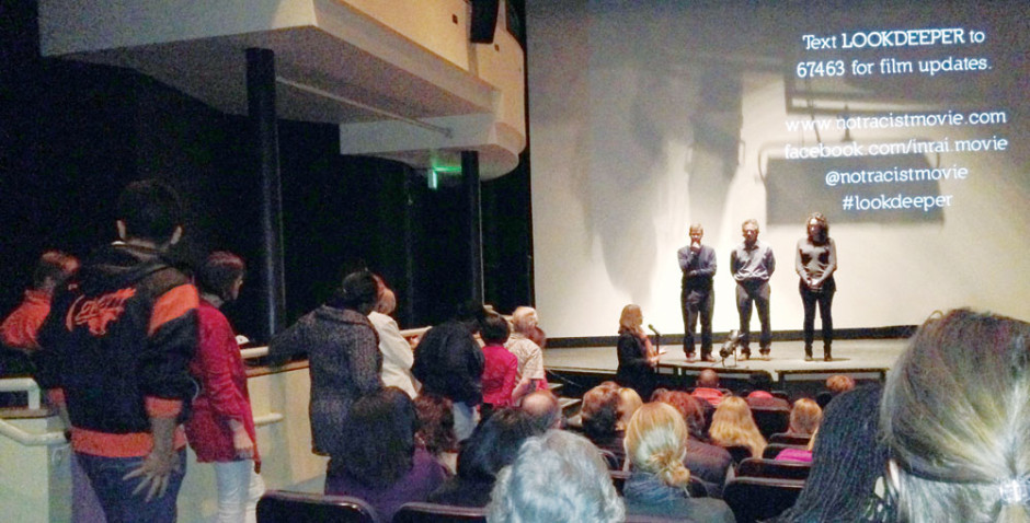 Attendees line up to comment after the DPS-sponsored showing of “I’m not a racist, am?” Photo by Maegan Parker Brooks