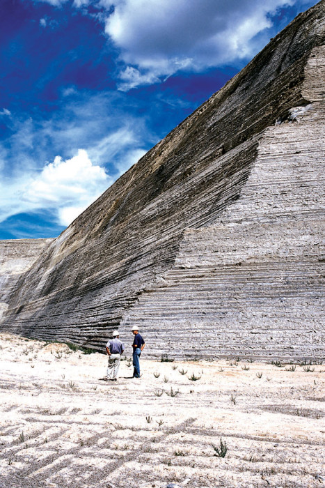 Miners discuss the stair-step-shaped wall of excavated gypsum in Gypsum, CO.  Photo: American Gypsum