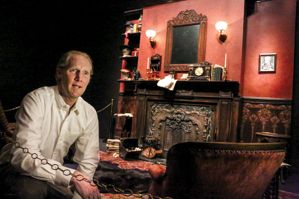 Curator James Hagadorn in Sherlock Holmes’ sitting room, where visitors can practice their powers of observation. “The little things are infinitely the most important,” said Sir Arthur Conan Doyle, creator of the Sherlock Holmes character.