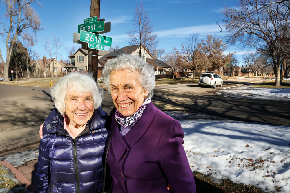 Helen Wolcott (left) and Anna Jo Haynes (right) stand along 26th Avenue. African Americans were refused home loans for houses south of 26th, where predominately white people lived. Wolcott and Haynes fought for Fair Housing and an integrated neighborhood.