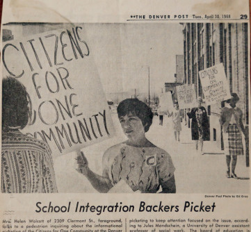 Helen Wolcott talks to a pedestrian about school integration outside the Denver School Administration Building in 1968. She and fellow picketers demanded DPS put together a plan for integration.