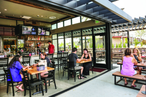 Torchy's Patio-Bar area provides indoor/outdoor dining for customers.