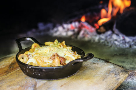 A pasta, sausage and cheese dish prepared in Wiggins’ traditional, Italian wood-fired oven.