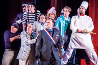 The Duke of Ephesus, Adriano, Luciano and the ensemble look on in amazement as Antiphola runs Doctor Pinch out of town.