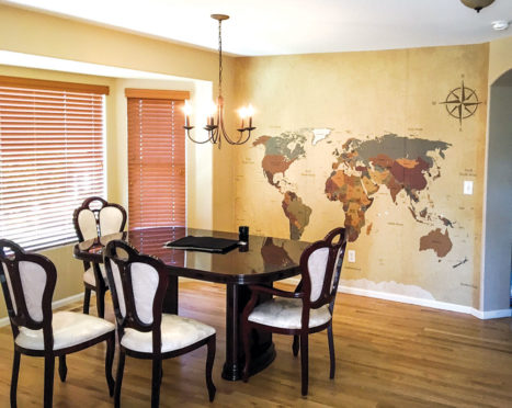 A family of travelers had Tribbett make a map into a mural for their dining room.