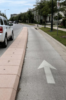 The original bike lanes are being retrofitted as cycle tracks, which provide more protection for bicyclists.