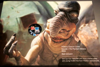 Watto, a junk dealer/human trafficker, throws the dice for young Anikan’s freedom. Three-dimensional dice are among the hidden movie ephemera intended for Star Wars ‘super-fans’ and kids.