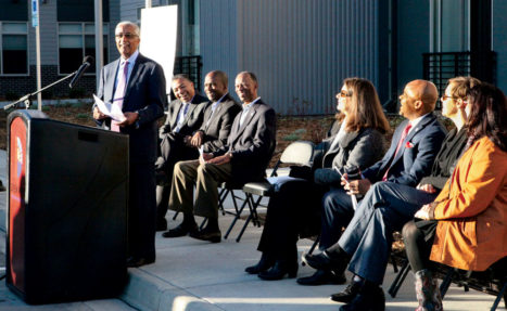 Gete Mekonnen, executive director of Northeast Denver Housing Center (NDHC), speaks at the apartment opening event. Dignitaries in attendance include Mayor Hancock, Rep. DeGette and Councilpeople Herndon, Kneich and Ortega.