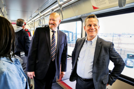  RTD Board Chair Larry Hoy and RTD Executive Director Dave Genova ride the train.