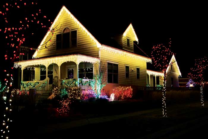 A house decorated with holiday lights