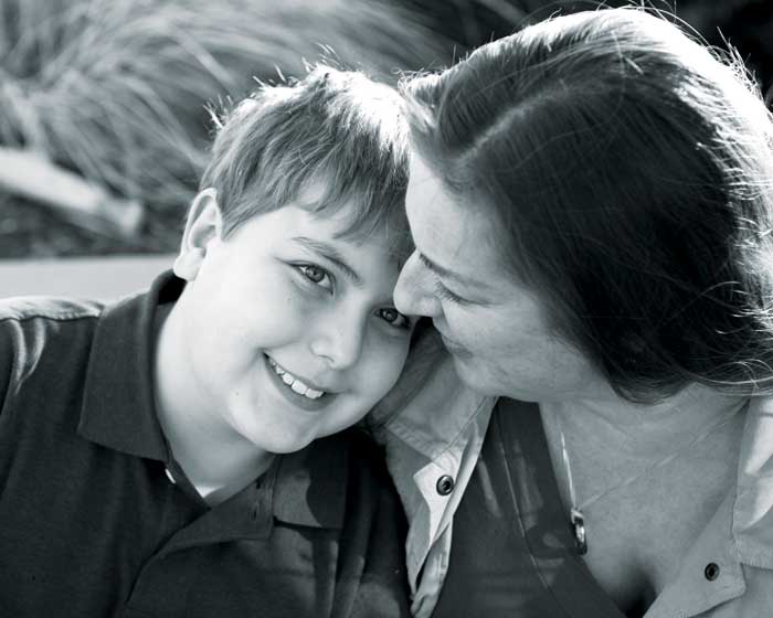 Max Smtih and his mom, Lolly Block, say it’s OK to be scared when you’re sick, but it’s also OK to have fun—their saving grace after discovering Max’s rare disease that led to brain surgery. Photo courtesy of Lolly Block. 
