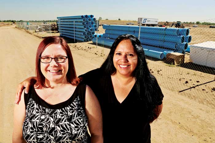 Dr. Amy Gile (left) and Lisa Ortiz (right) stand at the site where the new High Tech Elementary will be built between Verbena and Willow Streets at about 51st Avenue. Gile will be the principal and Ortiz the assistant principal. The two understand the community’s frustration in the decision process of the new school for Stapleton. They look forward to building trust and excitement in the community for the new program. 