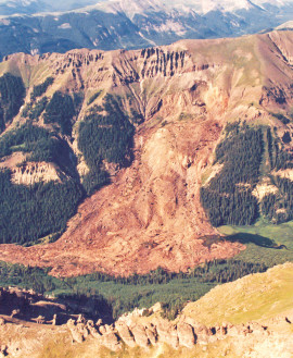Approximately 10.5 million cubic yards of material mobilized when heavy rains and meltwater triggered a catastrophic slope failure above West Lost Creek in the San Juan Mountains in 1991. Eyewitness reports suggested that the slide moved nearly half a mile in 30 seconds. Photos from CGS archive. 
