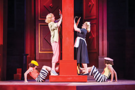 Left to right: Antiphola of Ephesus (left, standing) and Dromia are locked out by Luce and Dromia of Syracuse in The Comedy of Errors, a free and open to the public performance.