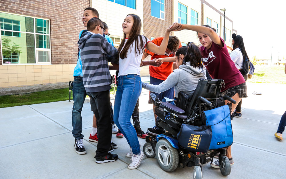 Northfield High School ninth graders participate in a team building activity at the Ninth Grade Academy during the week before school started.
