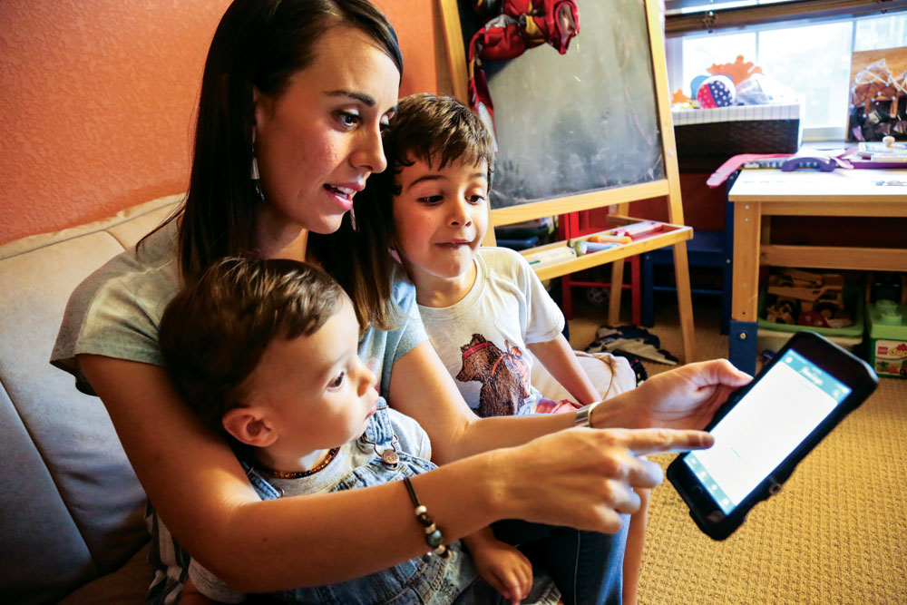 Sophia Cruz Davila uses the MamaLingua app with sons, Pablo, 4, and Daniel, 15 months. An example of the screen is shown at right.